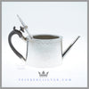 Feinberg Silver - The antique English silver plated bachelor teapot is of an oval neo-classical form with a flush hinged lid with a baluster form and ebony finial, ebony handle with a thumbpiece and a straight angular spout.
