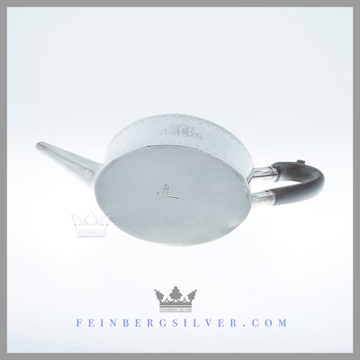 Feinberg Silver - The antique English silver plated bachelor teapot is of an oval neo-classical form with a flush hinged lid with a baluster form and ebony finial, ebony handle with a thumbpiece and a straight angular spout.