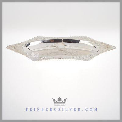 Feinberg Silver - The oval English silver plated basket has concave hexagonal sides with a scroll design and crimped edge.