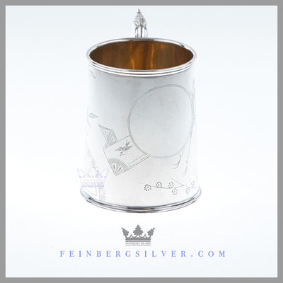 Feinberg Silver - The can shaped Antique English silver plate child's mug has a flat bottom and a scroll handle with an acanthus leaf thumb-piece. Feinberg Silver