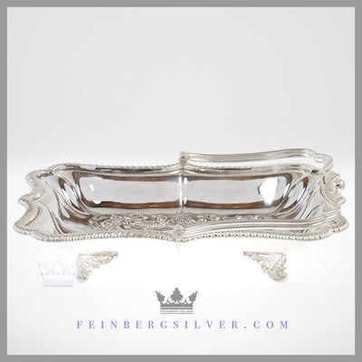 Feinberg Silver - The reticulated English silver plated basket has an applied gadroon border and a hand chased body with lattice, shell, leaf and scroll work, and stands on cast leaf and scroll feet.