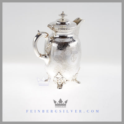 Feinberg Silver - The English silver plated jug has an ovoid body and stands on 4 scroll feet with acanthus leaf feet. The jug has a similar, matching handle, a hinged lid with a square, baluster form finial.