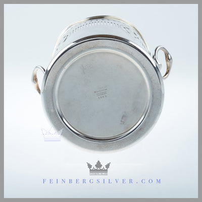 The antique English silver plated syphon stand has a vertical body with a scalloped rim with an applied thread border. Feinberg Silver