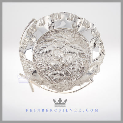Victorian  silver brides basket wedding centerpiece Feinberg Silver - The round English silver plated basket has a swing handle with Scottish thistles on the top of the handle.