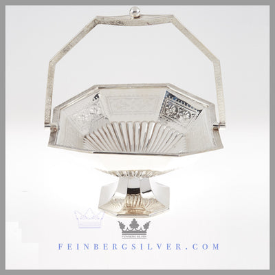 Feinberg Silver - The antique English silver plated basket is oblong with cut corners. The basket has an applied floral border with sides of rosettes and a fluted bottom.