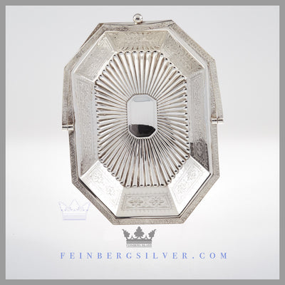 Feinberg Silver - The antique English silver plated basket is oblong with cut corners. The basket has an applied floral border with sides of rosettes and a fluted bottom.