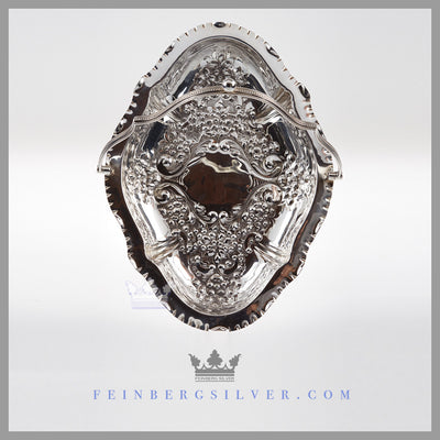 Feinberg Silver - The English silver plated basket is reticulated and oval shaped with a crimped edge